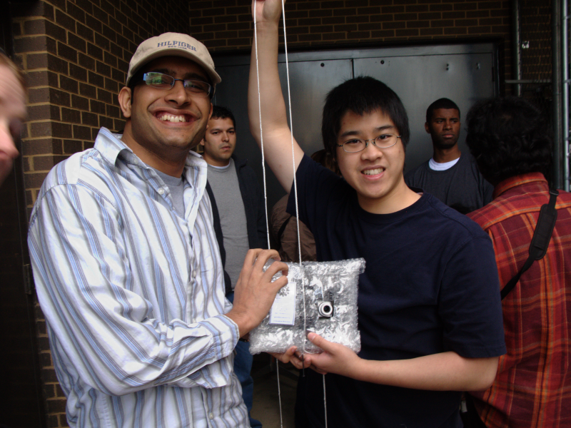 Satyam and Ethan with packaged payload